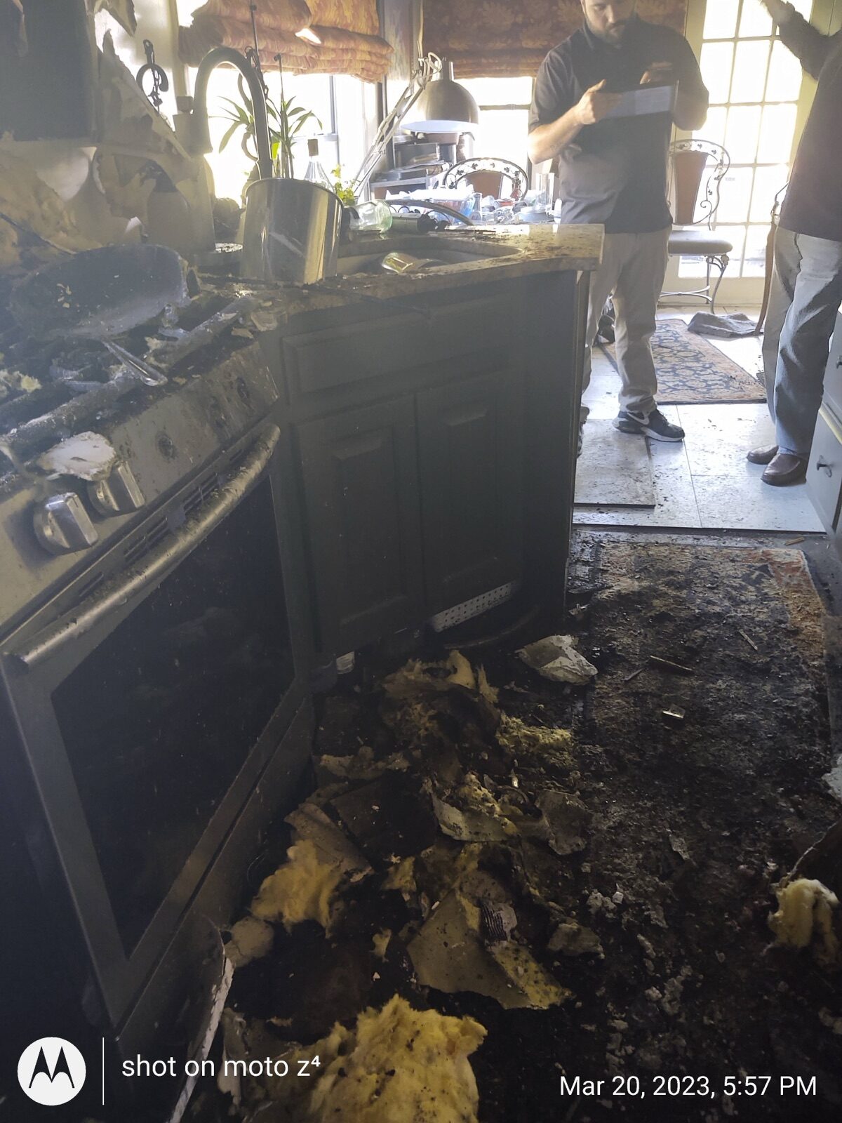 Charred kitchen cabinets from residential fire — Greenlight Claims public adjuster